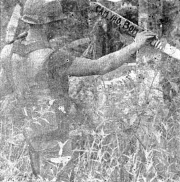 SSG Edward Cole reads the signs