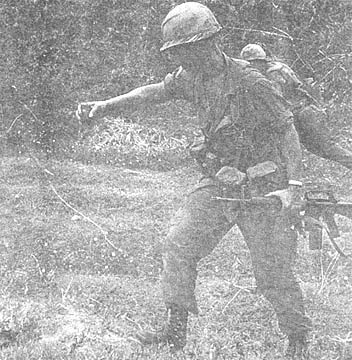 Dropping grenade into VC tunnel