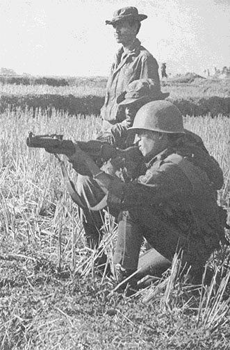 SSG Silas Moses helps