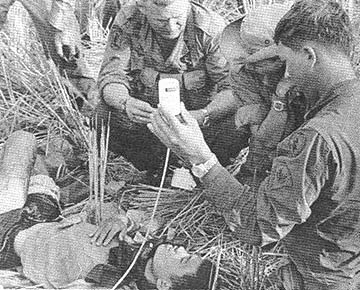Cpt. Wayne Downing, Medic SP4 Dennis Murphy