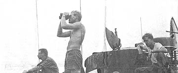 1Lt. Daniel Putman scans bank