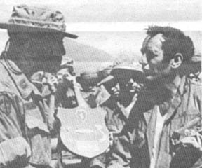 Cpt. Ronald C. Owens presents to Joey Bishop
