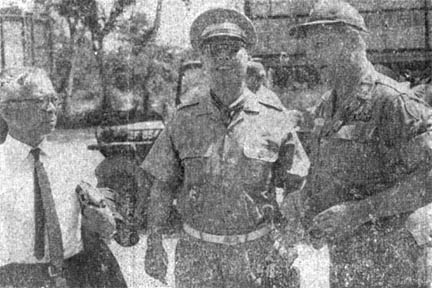 Mr. Shishikuri, Col. Fujii, Lt. Col. Robert Hicks