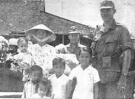 Lt. Col. John Hendry with Vietnamese