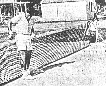 1Lt. Lewis Stien teaches tennis