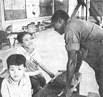 Holloman with students