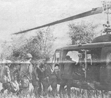 Wolfhounds loading captured rice