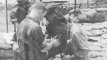 1Lt. James Mitchell lights Chieu Hoi cigarette