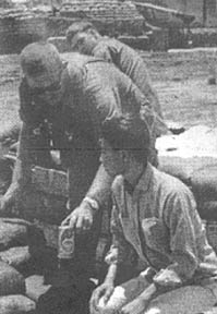 Lt. Col. G. E. Taylor offers soda