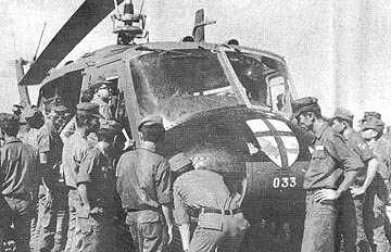 ARVN officers inspect huey